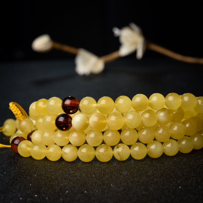 9.5mm鸡油黄蜜蜡佛珠-红掌柜