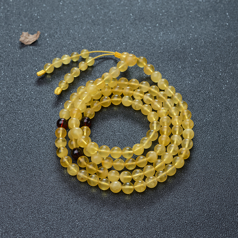 鸡油黄金绞蜜佛珠-红掌柜