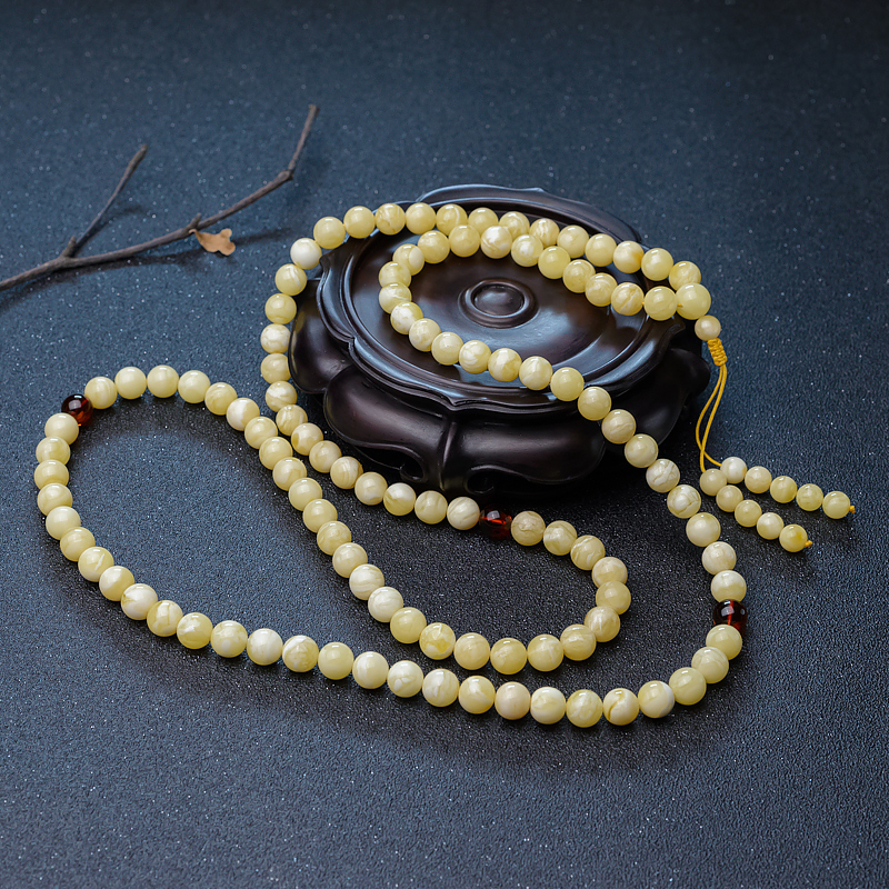 9.5mm白花天然蜜蜡佛珠-红掌柜
