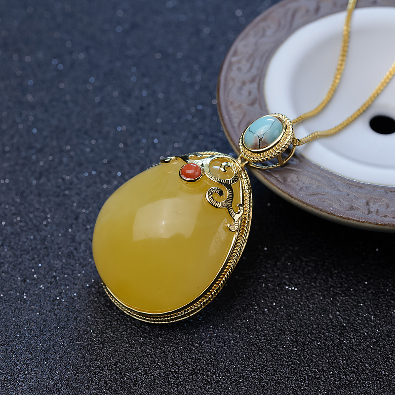 银镶蜜蜡水滴吊坠-红掌柜