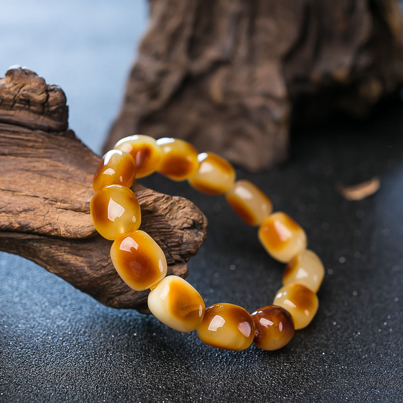 波罗的海俏色蜜蜡随形单圈手串-红掌柜