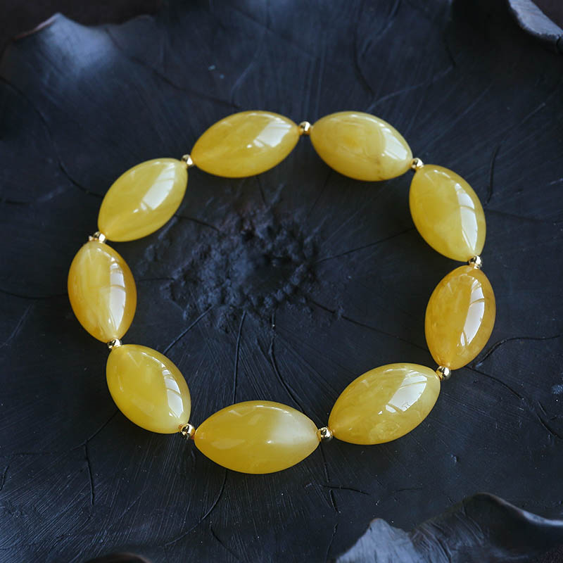 鸡油黄蜜蜡橄榄珠手串-红掌柜