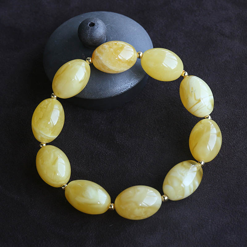 鸡油黄橄榄珠手串-红掌柜