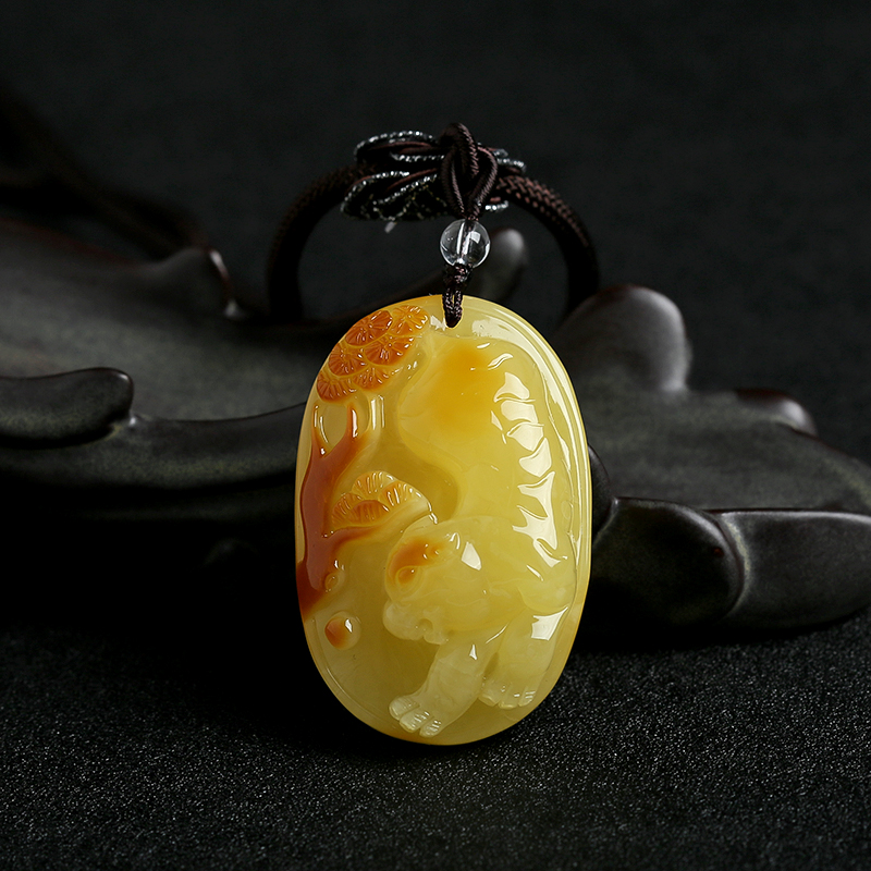 波罗的海天然带皮蜜蜡老虎吊坠 - 红掌柜