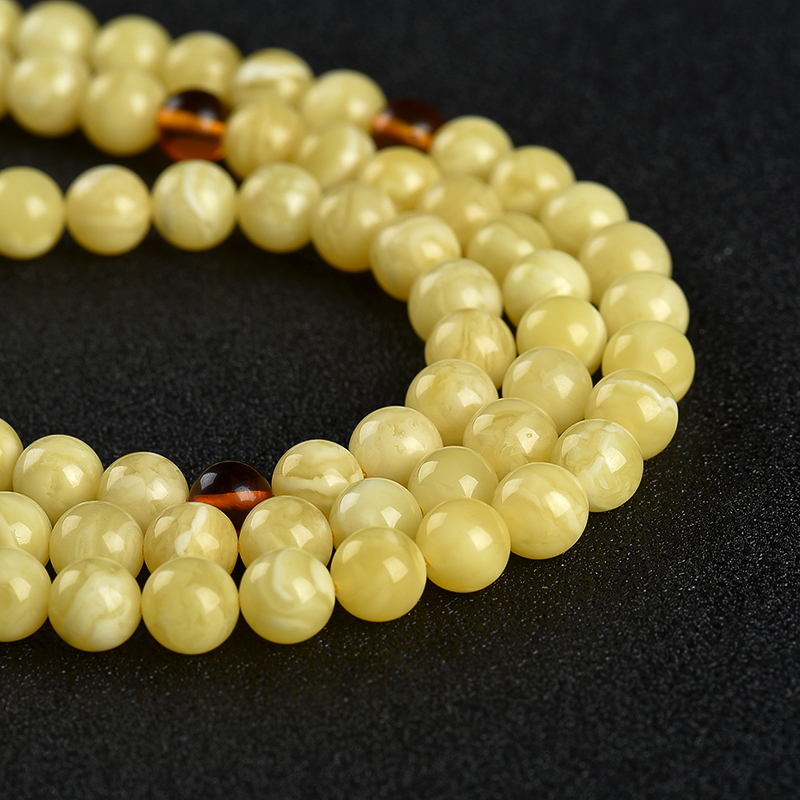 波罗的海天然浅黄白花蜜佛珠-红掌柜