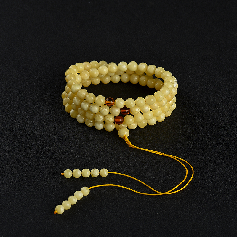 天然浅黄白花蜜108佛珠-红掌柜