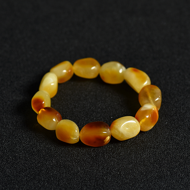 天然俏色蜜蜡随形手串-红掌柜