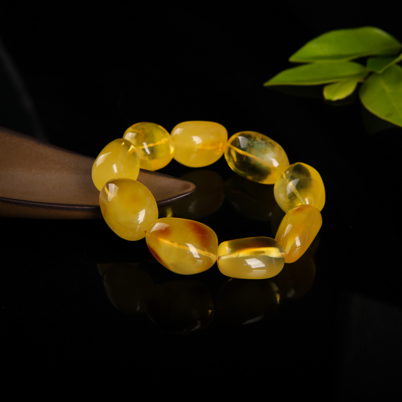 天然带皮鸡油黄金绞蜜随形单圈手串-红掌柜