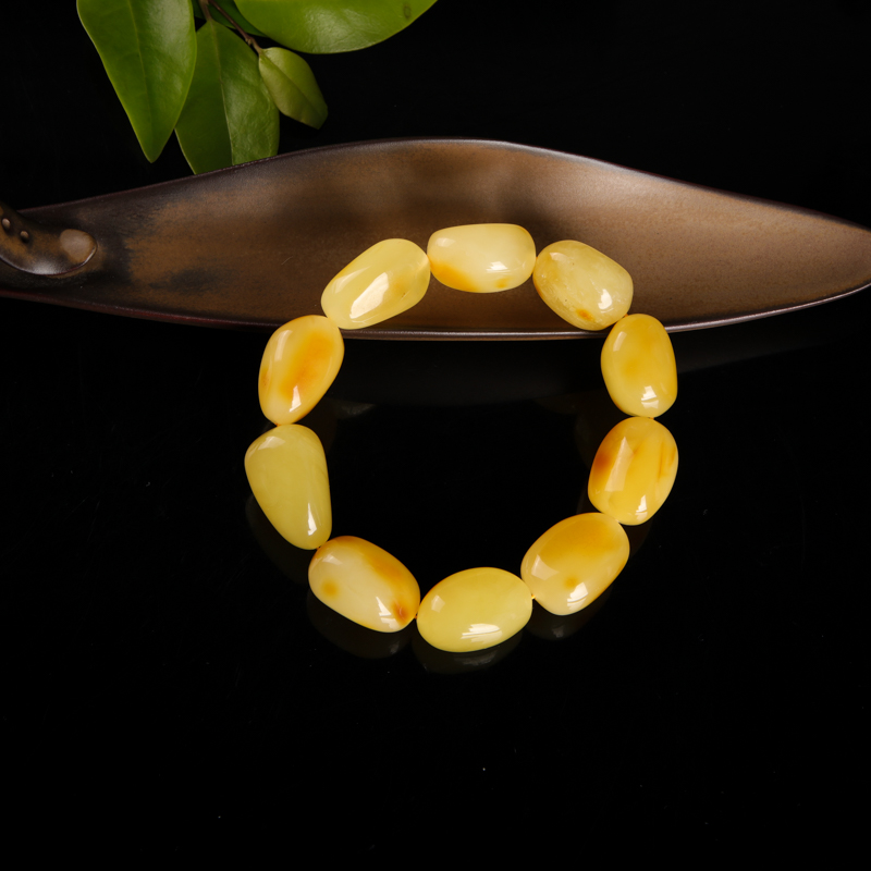 带皮鸡油黄蜜蜡随形单圈手串-红掌柜