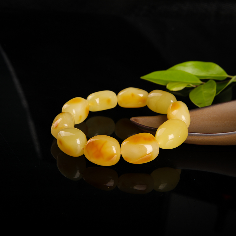 波罗的海带皮鸡油黄蜜蜡随形单圈手串-红掌柜