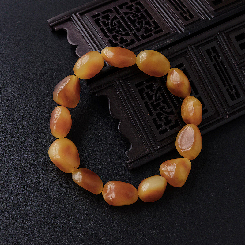 波罗的海天然带皮鸡油红随形蜜蜡手串 - 红掌柜