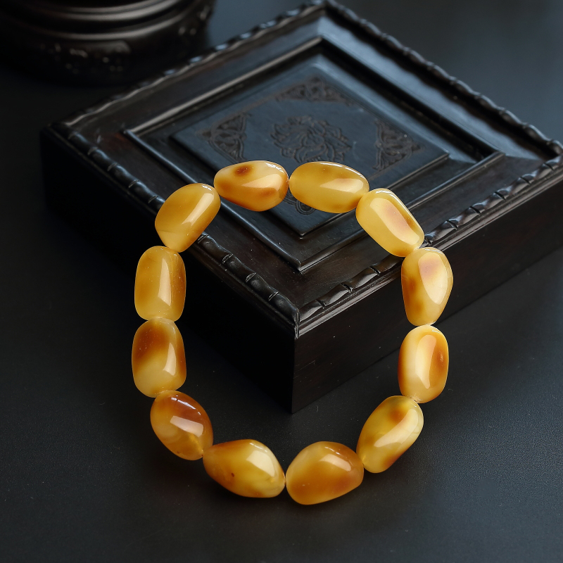 鸡油黄蜜蜡随形手串-红掌柜