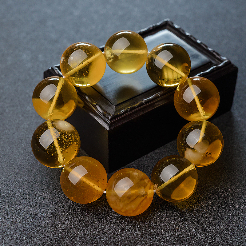 23mm鸡油黄金绞蜜手串-红掌柜