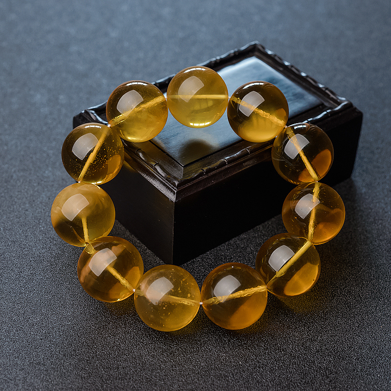 21.5mm鸡油黄金绞蜜手串-红掌柜