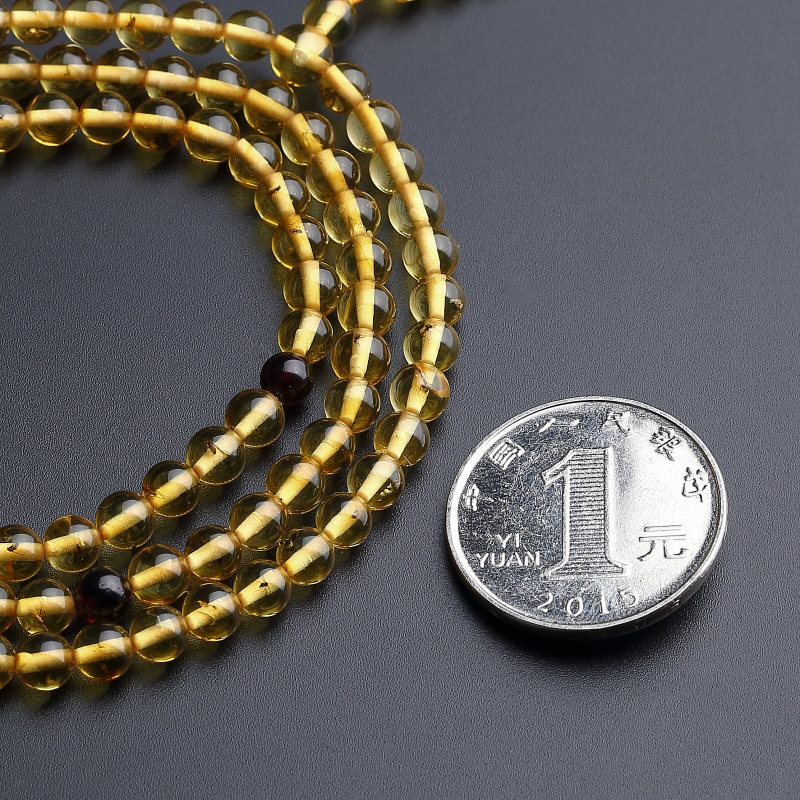 5mm虫珀佛珠手串-红掌柜