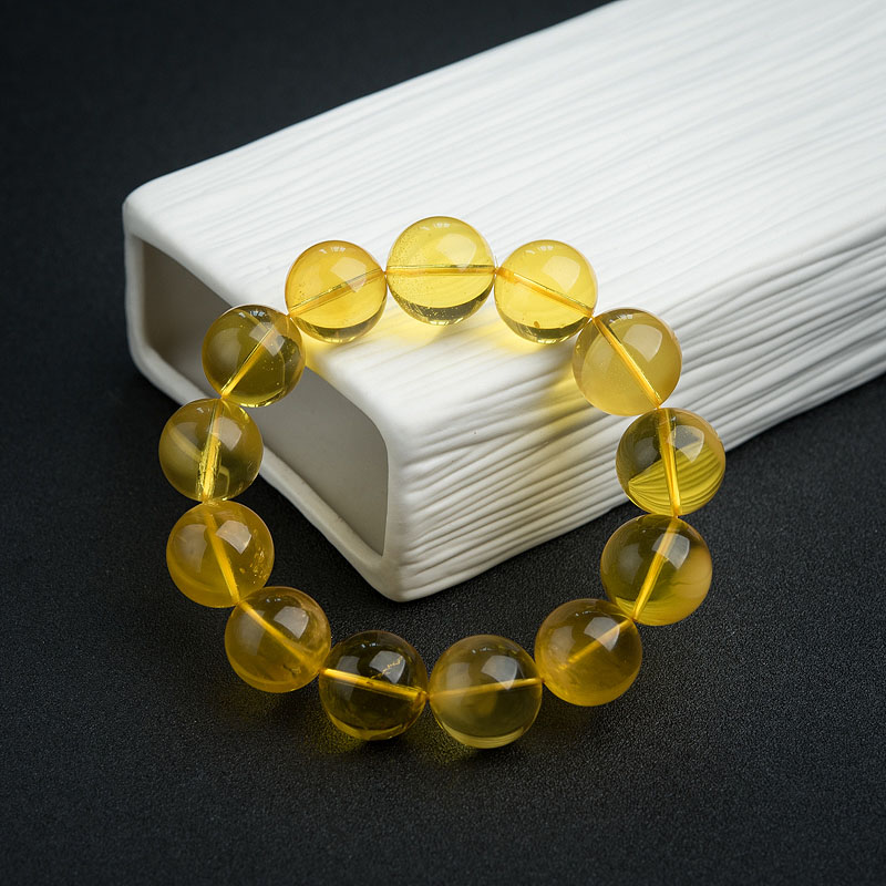 17mm鸡油黄金绞蜜手串-红掌柜