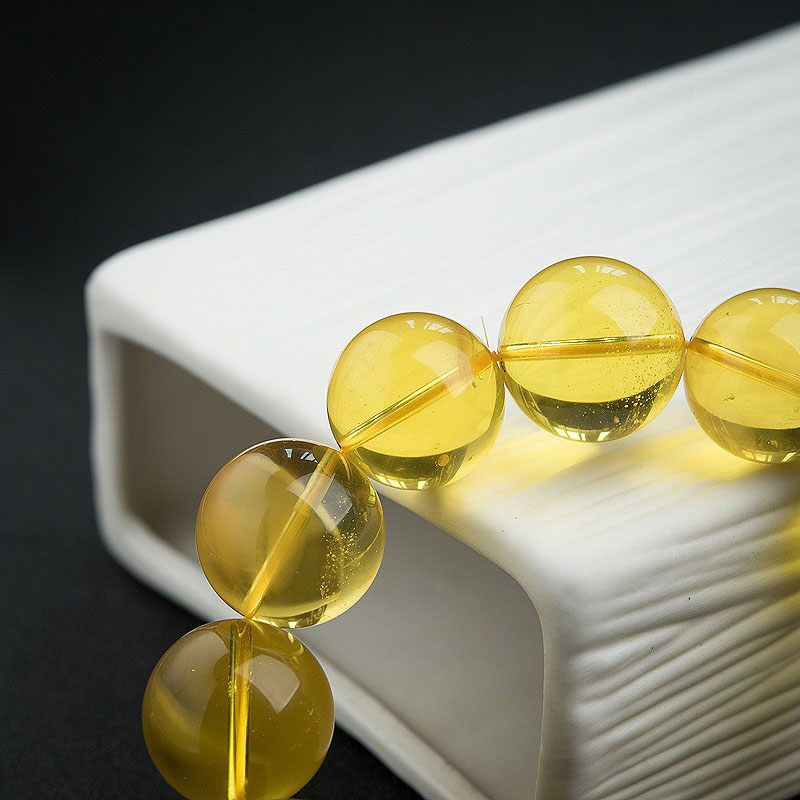 波罗的海鸡油黄金绞蜜手串-红掌柜