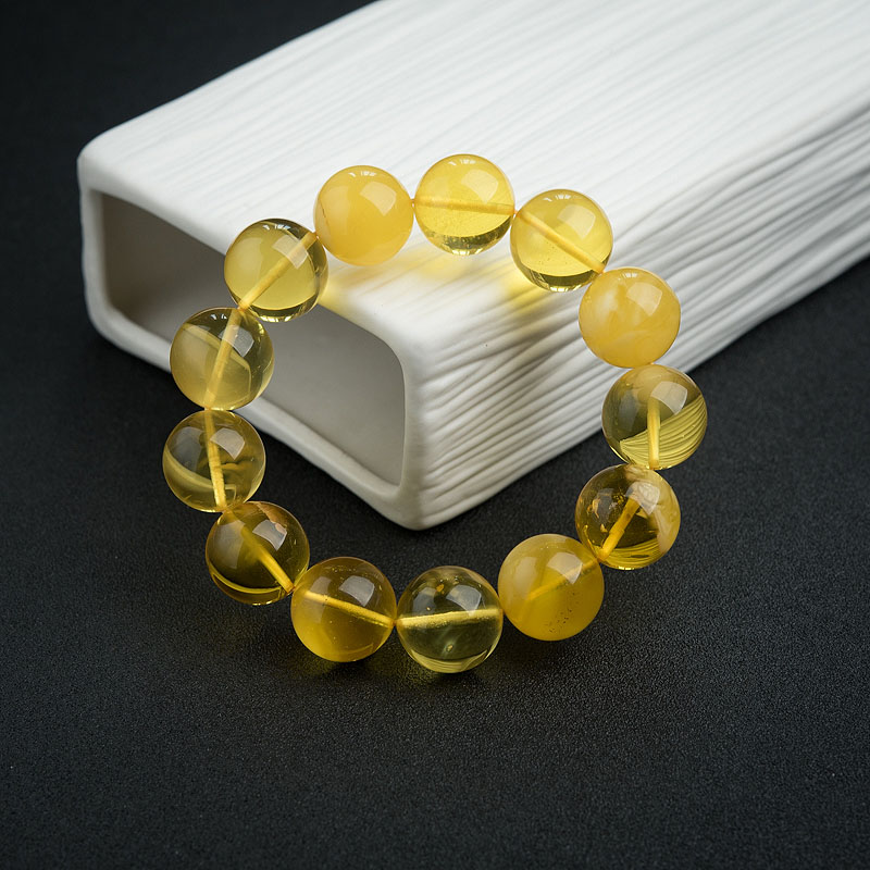 16mm鸡油黄金绞蜜手串-红掌柜