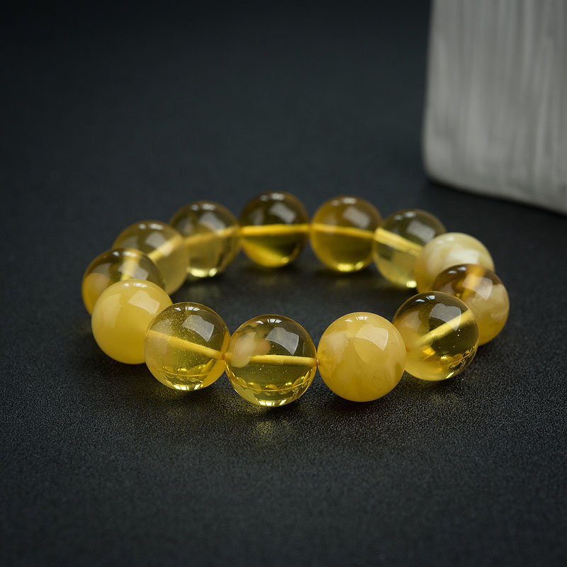 天然鸡油黄金绞蜜手串-红掌柜