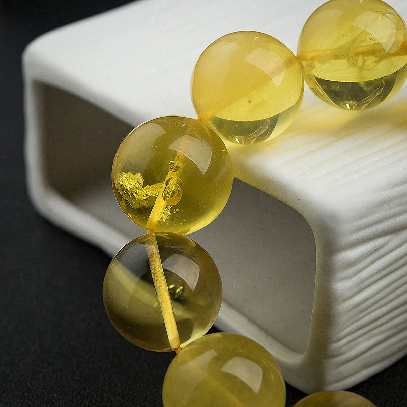 波罗的海鸡油黄金绞蜜手串-红掌柜