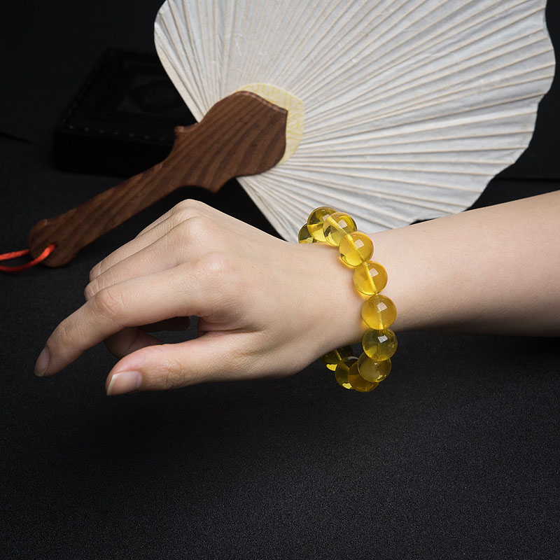 波罗的海鸡油黄金绞蜜手串-红掌柜