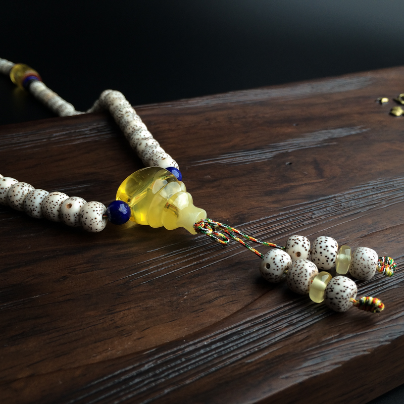 金绞蜜蜜蜡佛珠-红掌柜