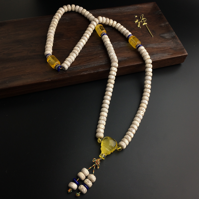 天然金绞蜜蜜蜡佛珠-红掌柜