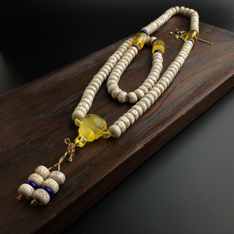 金绞蜜蜜蜡佛珠-红掌柜