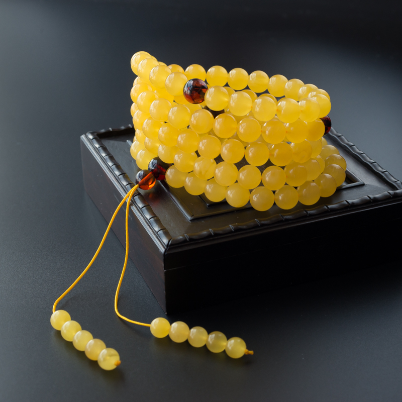 9mm蜜蜡佛珠-红掌柜