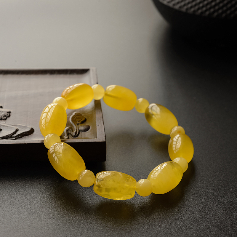 鸡油黄蜜蜡桶珠手串 - 红掌柜