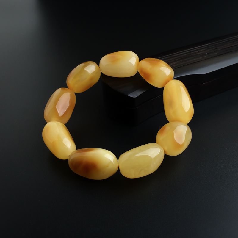 鸡油黄蜜蜡随形手串 - 红掌柜