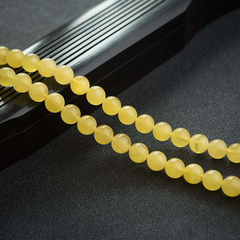 7.5mm鸡油黄蜜蜡佛珠-红掌柜