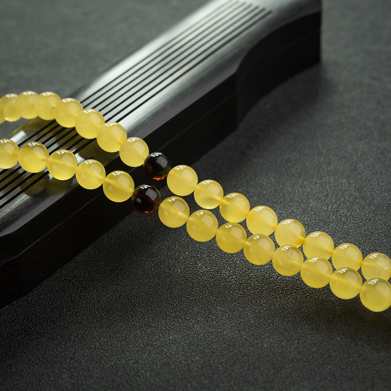 鸡油黄金绞蜜108佛珠-红掌柜