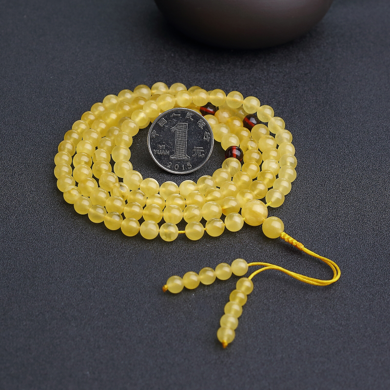 鸡油黄金绞蜜108佛珠-红掌柜