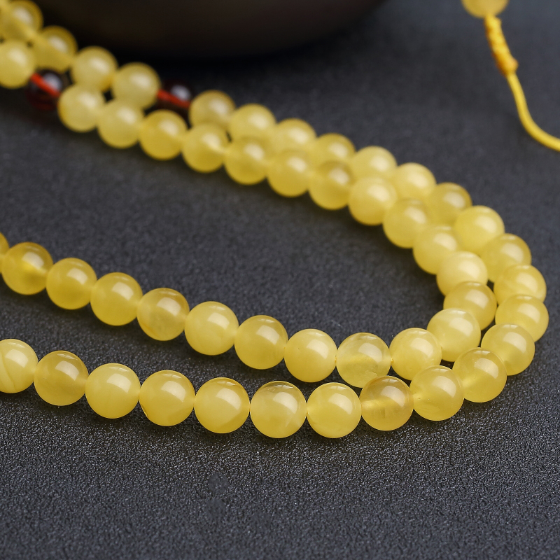 波罗的海天然金绞蜜108佛珠-红掌柜