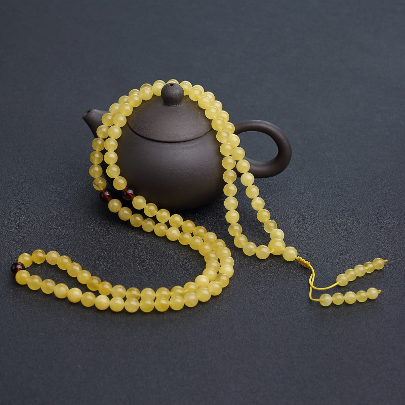 天然鸡油黄金绞蜜108佛珠-红掌柜