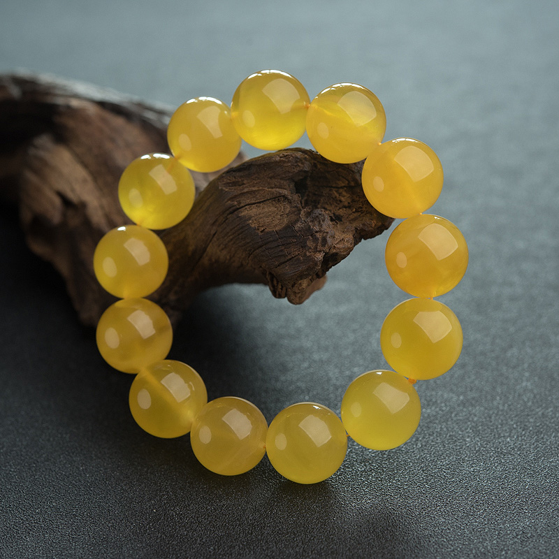 鸡油黄金绞蜜单圈手串-红掌柜