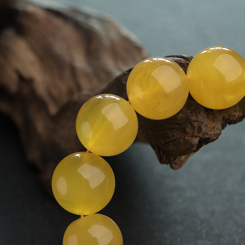 天然鸡油黄金绞蜜手串-红掌柜