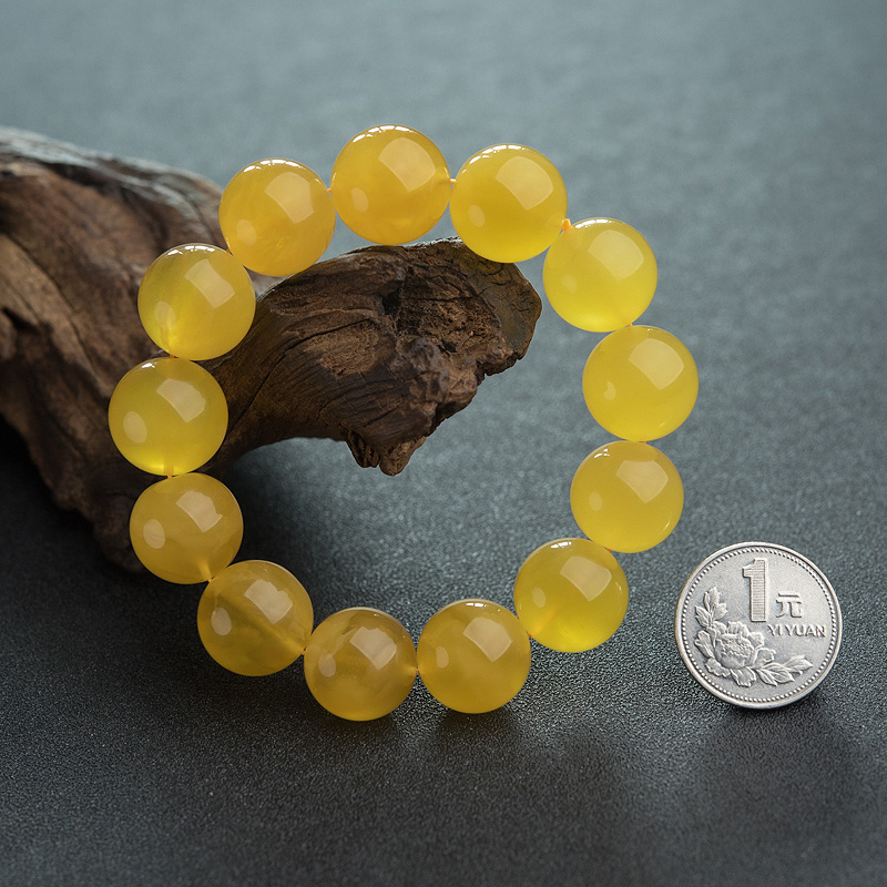 波罗的海鸡油黄金绞蜜手串-红掌柜