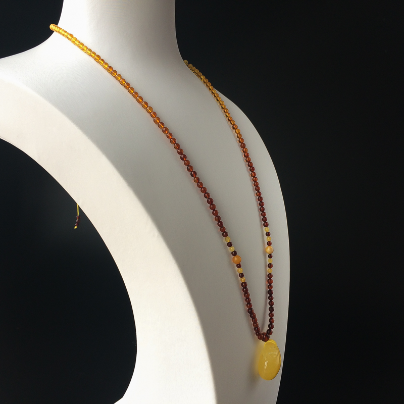 波罗的海鸡油黄蜜蜡钱袋吊坠-红掌柜