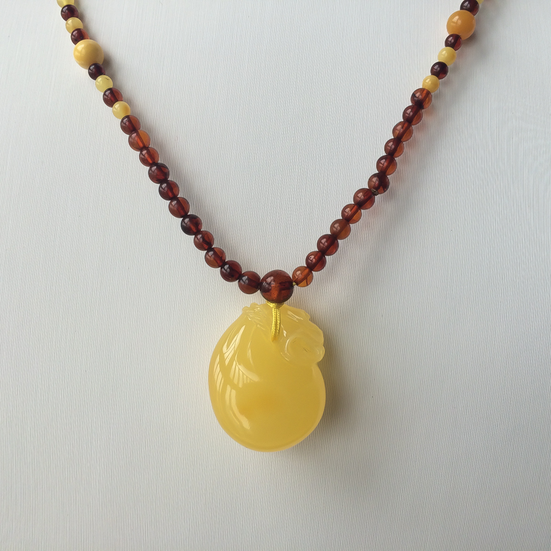 鸡油黄蜜蜡钱袋吊坠-红掌柜