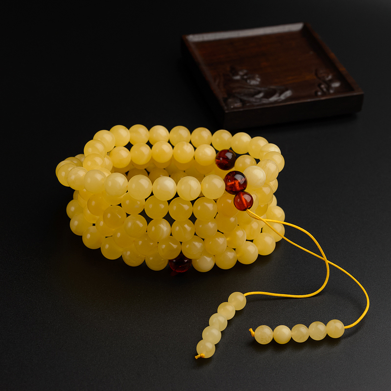9.5mm鸡油黄蜜蜡佛珠-红掌柜