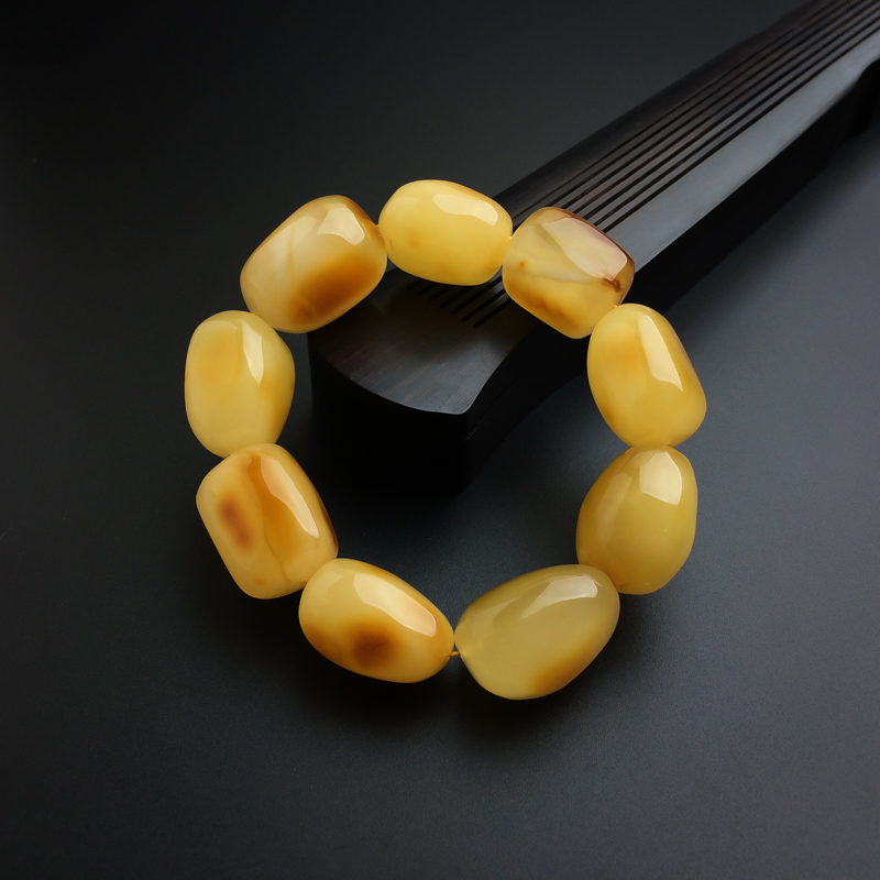 鸡油黄蜜蜡随形手串-红掌柜