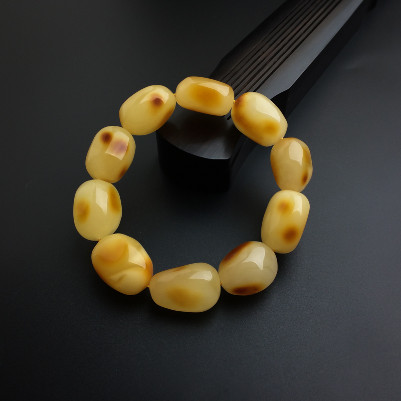 鸡油黄蜜蜡随形手串-红掌柜