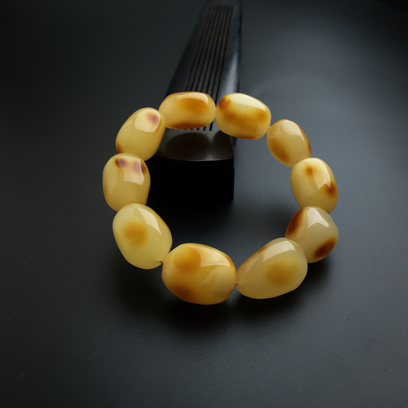 鸡油黄蜜蜡随形手串-红掌柜