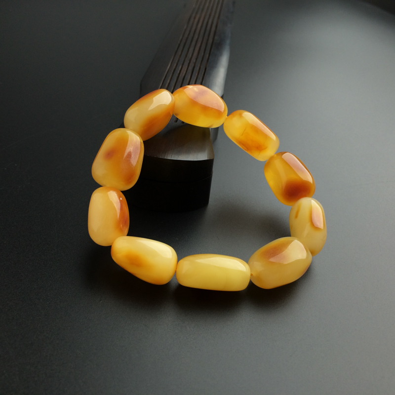 鸡油黄蜜蜡随形手串-红掌柜