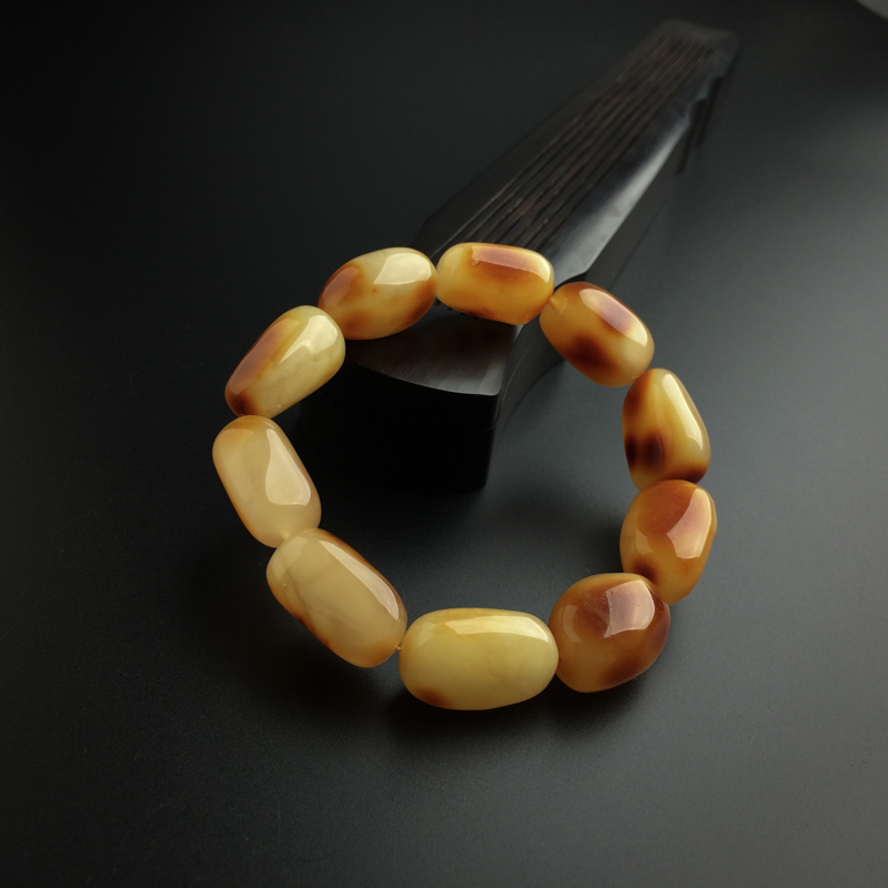 鸡油黄蜜蜡随形手串-红掌柜