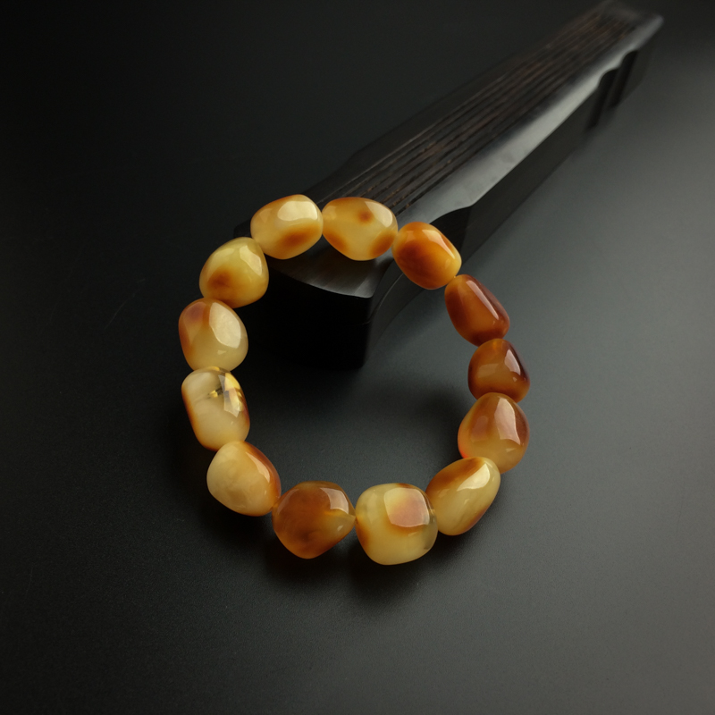 鸡油黄蜜蜡随形手串-红掌柜