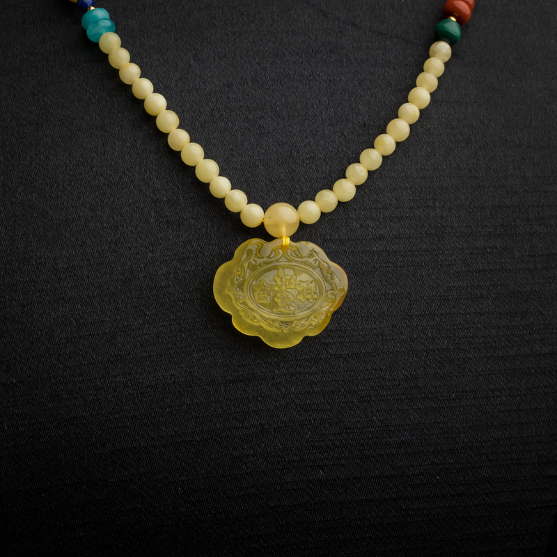 柠檬黄蜜蜡挂件-红掌柜