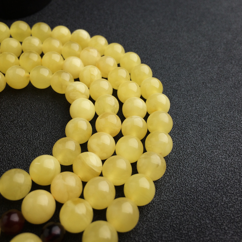 鸡油黄蜜蜡佛珠 - 红掌柜